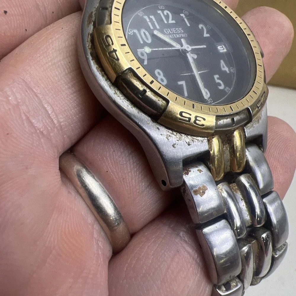 Guess Waterpro Mens Two Tone 100M Quartz Watch Date Bezel needs battery.